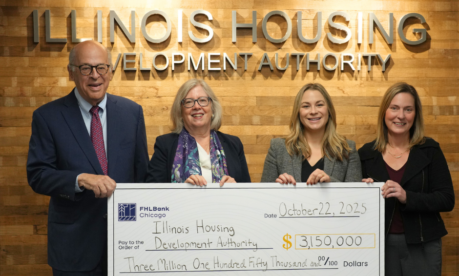 IHDA leaders receiving check from FHLBank Chicago